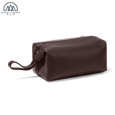 China ENGLAND STYLE Stylish Hanging Genuine Leather Travel Bag Toiletry Frame Cosmetic Bag for sale