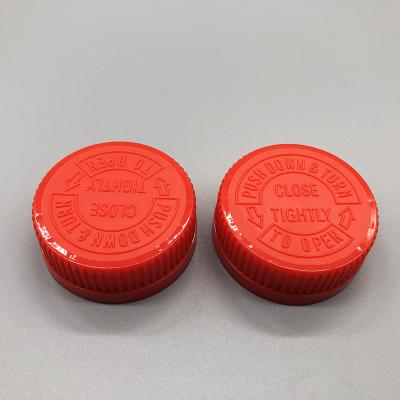 China Non Spill 38mm Plastic Red CRC Security Screw Cap Ribbed Cosmetic Cap Black Child Proof Cap for sale