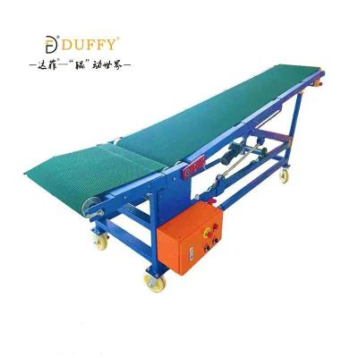 China Good Quality Heat Resistant Efficiency Slope Hydraulic Climbing Conveyor For Truck Loading And Unloading for sale