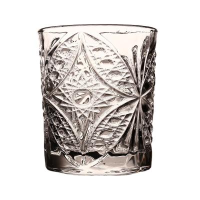 China Europe European whiskey butterfly pattern wine ice hockey spirit glass embossed glass brandy for sale