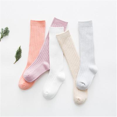 China QUICK DRY custom pure color cotton stripe baby bangs double needle over calf stockings for sale