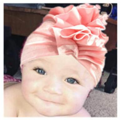 China New Lovely Dobby Baby Covers Flower Design Turban Headwear Velvet Baby Soft Hats and Caps for sale