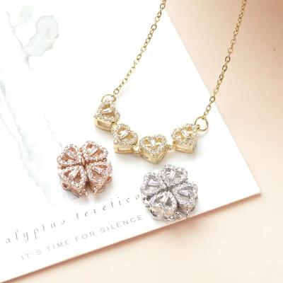 China Eco-Friendly/Classic Crystal Gold Plated Heart Magnet Necklace Lucky Four Shape Dismountable Rotating Pendant Necklace Jewelry For Women for sale