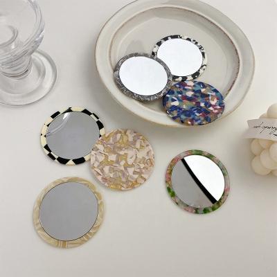 China Ziming Traditional Vintage Round Shape Make Up Mirror Split Shell Tortoise Small Daily Make Up Mirror For Girls Factory Sale for sale