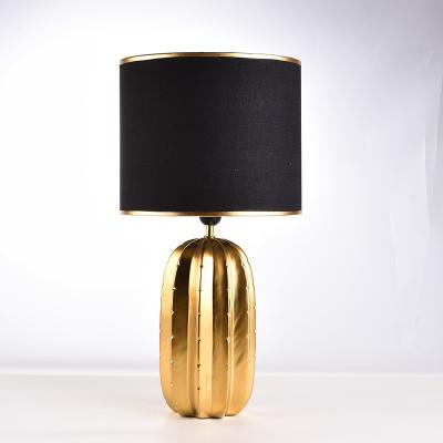 China Luxury modern gold cactus ceramic table lamp for hotel living room decoration for sale