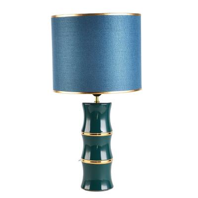 China Modern new design simple green gold ceramic table lamp for living room decoration for sale