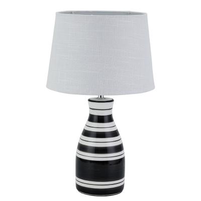 China New arrival black line modern painting ceramic 18 inch crackle living room table lamp home decoration for sale