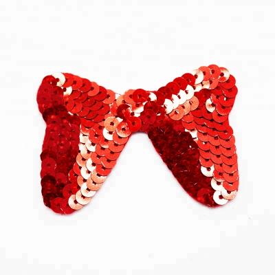 China Viable Custom Girls Skirt Clothes Bling Bling Bow Patch Embroidery Sequin Patch for sale