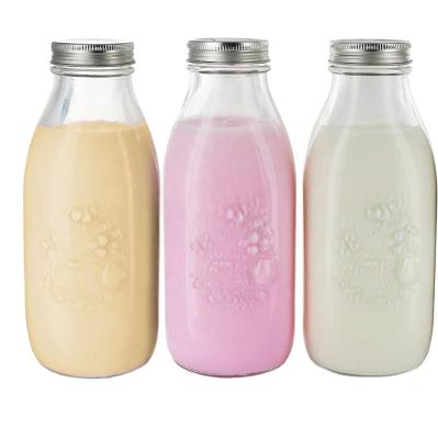 China Freshness Preservation 1000ml Glass Milk Honey Beverage Yogurt Bottle Jar with Metal Airtight Lid for sale