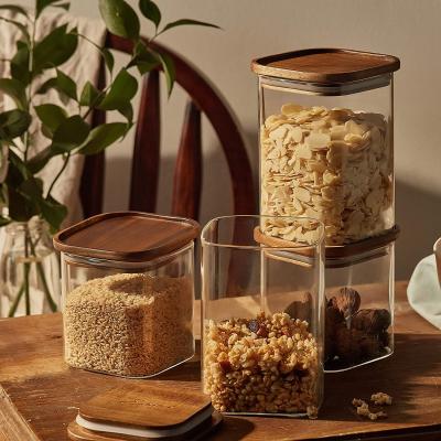 China Freshness Preservation Hot Sale Borosilicate Glass Jar With Wooden Lid Food Storage for sale