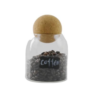 China Heat Resistant Borosilicate 16oz Coffee Tea Food Storage Heat Resistant Glass Jar With Cork Ball Lid for sale