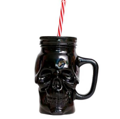 China Freshness Retention Wide Mouth Colored Skull Shape 500ml Glass Mason Jar Mug With Lid Straw Handle for sale