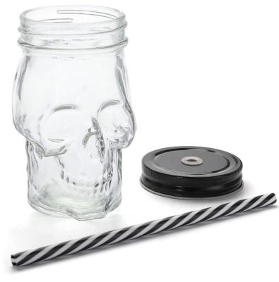 China Clear Freshness Keeping Wide Mouth Skull Shape Glass Mason Jar 12 Ounce With Black Leak Proof Screw Metal Lid Straw for sale