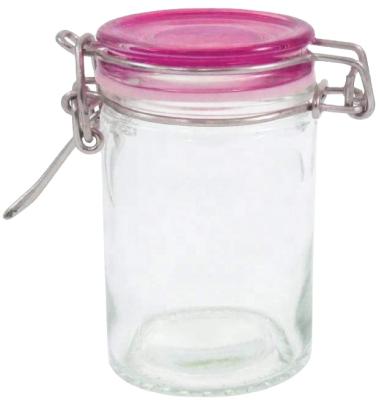 China 2.5 oz Small Round Airtight Airtight Glass Candy Food Tea Spice Storage Jar With Glass Clip Lid for sale