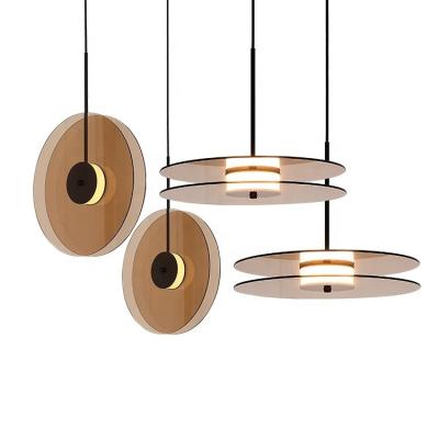 China Modern Designer Contemporary Nordic Flying Pendant Light Bedroom Disc Pendant Light Chandelier for sale