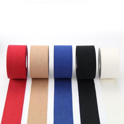 China Breathable Wholesale 3.8cm*13.7m Athletic Sports Tape Finger Protecting Cotton Sports Tape for sale