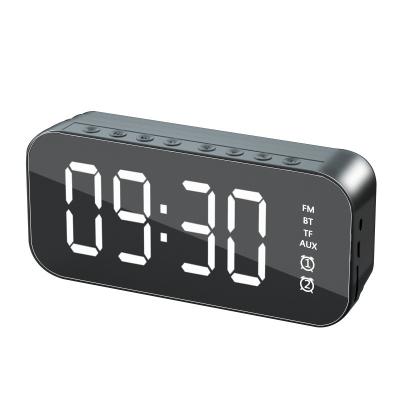 China Hot Selling Portable Mini Alarm Clock Time Mirror Display Subwoofer Blue tooth Wireless Speaker wireless speaker for sale