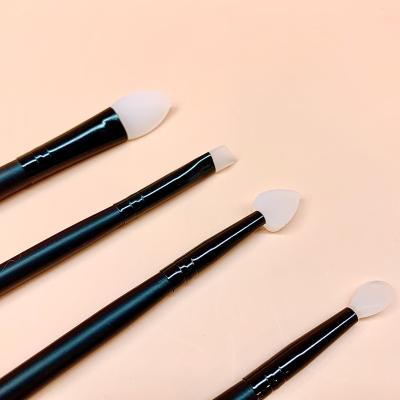 China Comfortable Handle Wholesale Adjustable Beauty Tools Bar Film Brush Mask Soft Silica Gel Factory Supplies Soft Head Makeup Brush for sale