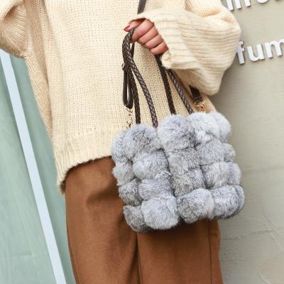 China 2020 New Fashion Bucket Natural Rabbit Fur Plush Pompom Bag Luxury Women Handbag For Lady Fashion Tote Bag for sale