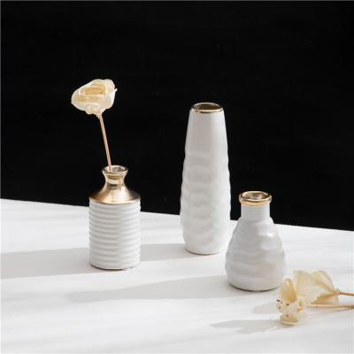 China Minimalist Opens Cheap Artistic Bud Vases Simple Design For Home Decor White Flower Vases For Home Decor for sale