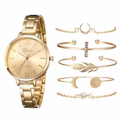 China New Arrival Vogue Gold Stainless Steel Watches Women Ladies Quartz Day/Date Dress Bracelet Watches With Bracelet for sale