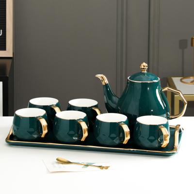 China Teaware 8 Pcs Viable Luxury Royal Embossed Design Porcelain Teapot Set Green Glazed Ceramic Tea Set Coffee Mug Set For Gift for sale