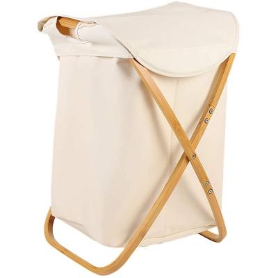 China Modern X-frame Folding Laundry Hamper Portable And Collapsible Storage With Removable Bag Poly / Cotton Cloth Liner for sale