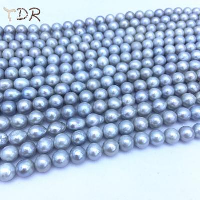 China Baroque Freshwater Pearl 10-11 Mm Core Freshwater Pearl Cultured Strand Silver Color for sale