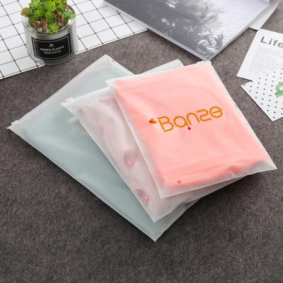 China BIODEGRADABLE Wholesale Custom Logo Frosted Plastic Bag Clothes Zipper Lock Self-Sealing Clothing Packaging Frosted Zipper Bags Printed Logo for sale