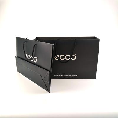 China Fashion Design Recyclable Appearance Printed Packaging With Handles Gift Paper Bag for sale