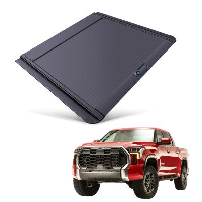 China Tailbox Car Parts Roll Cover Up Pick Up Truck Aluminum Alloy Tonneau Cover For Toyota Tundra 2014+ for sale