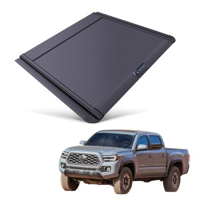 China Tailbox Car Parts Roll Cover Up Pick Up Truck Aluminum Alloy Tonneau Cover For Toyota Tacoma 2012+ for sale