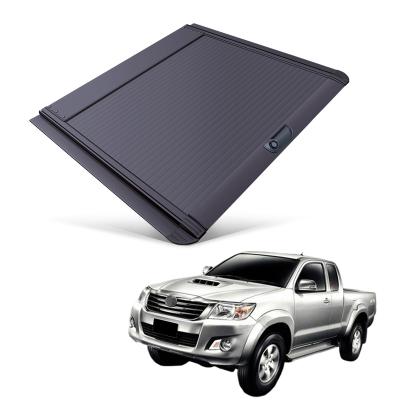 China Tailbox Car Parts Roll Cover Up Pick Up Truck Aluminum Alloy Tonneau Cover For Toyota Vigo 2005-2014 for sale