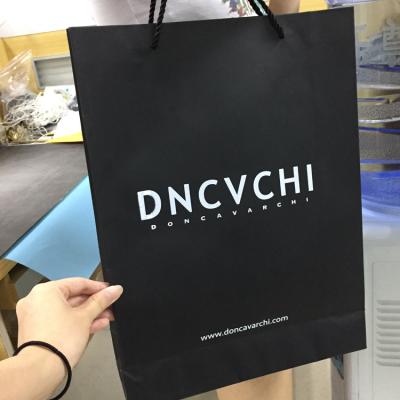 China Wholesale Recyclable Custom Printed Black Luxury Shopping Paper Gift Bag From Professional Manufacturer In China for sale