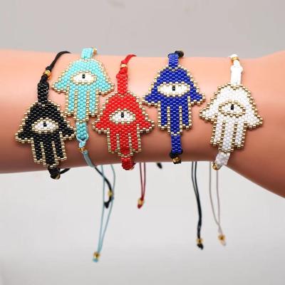 China FASHIONABLE Imported Fatima Hamsa Palm Acorn Palm Japanese Hand Bead Woven Bracelet Japanese Rice Miyuki Bracelet European and American for sale