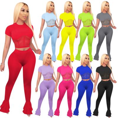 China Anti-pilling 2021 hot selling women fall clothing mesh patchwork solid sports long sleeve two piece set for sale