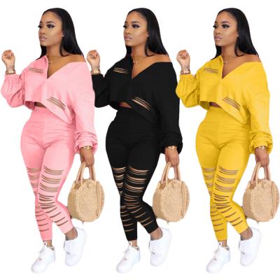 China Fall 2021 new arrival anti-pilling solid color women's clothes burnt out sportswear trackers suits hollow out women's two-piece set for sale