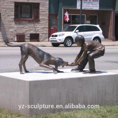 China Europe Landscape Life Size Bronze Boy Playing With Dog Statue BFSN-B060A for sale