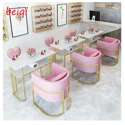 China Comfortable Luxury Custom Salon Furniture Pink Nail Manicure Table Double With Dust Collector for sale