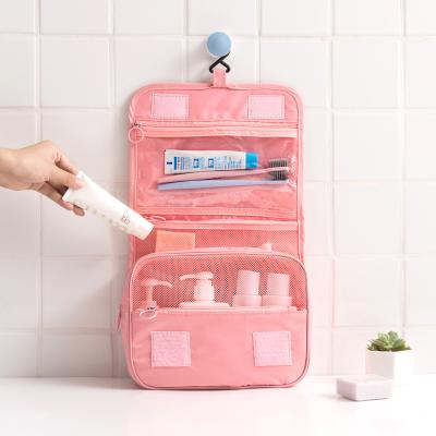 China Fashion Korean New Style Portable Wash Bag Waterproof Travel Large Capacity Storage Bag Portable Hook Toiletry Bag for sale