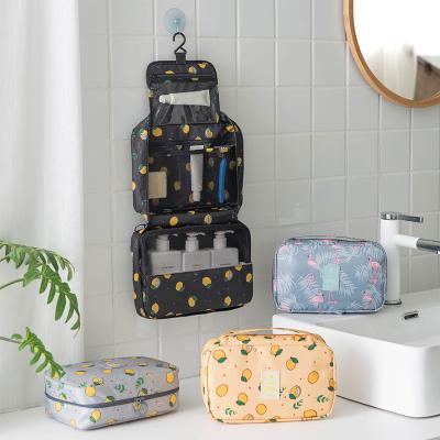 China Portable Fashion Travel Toiletry Bag Large Capacity Storage Make Up Hanging Bag Flamingo Toiletry Bag for sale