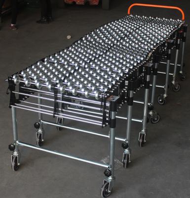 China Oil Resistant Container Unloading System Manual Conveyor Flexible Steel Wheels for sale