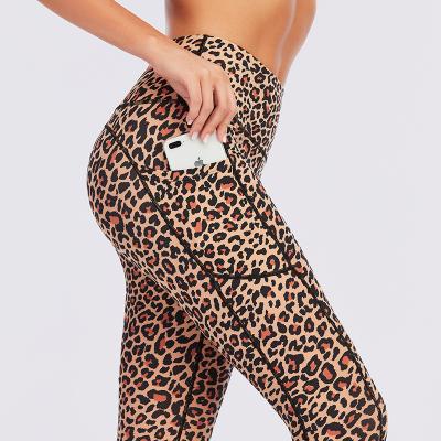 China Breathable High Quality Sublimation Control Women Leopard Print High Waist Fitness Yoga Leggings With Pockets for sale