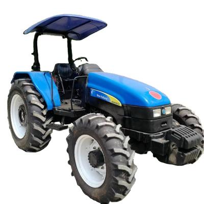 China used/factory second hand/new new holland tt75 80hp 4x4wd farm wheel rc agricultural tractors with small compact mini equipment for sale