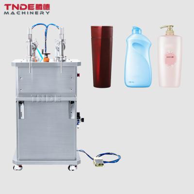 China 150ml Cosmetic Vertical Food Bottle Filling Machine Semi-automatic Double Head Filling Machine for sale