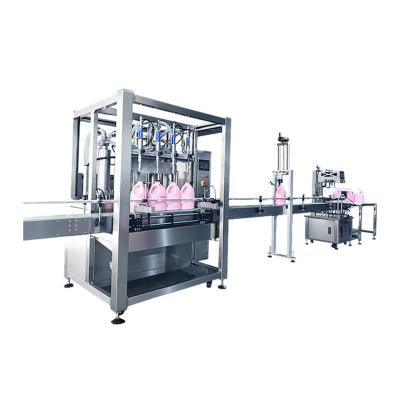 China Automatic Food TENGDE 2 Laundry Detergent Cylinder Nozzles Filling Pressing Capping Machine for sale