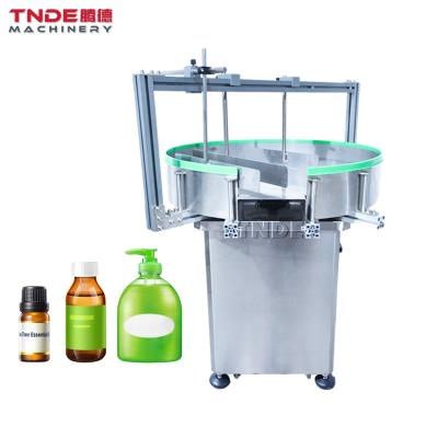 China Medical ; cosmetics; biological lathe round bottle rotary collector receiving accumulator table unscrambler machine for sale