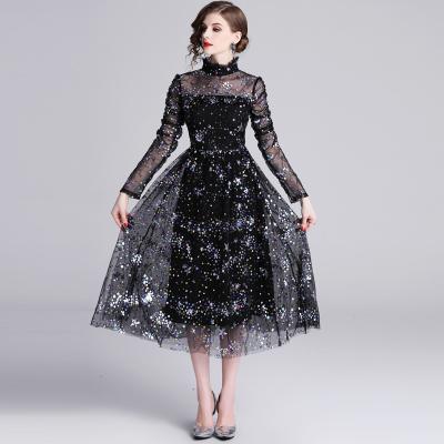 China Anti-Static Women's Mesh Dinner Dress Long Sleeve Sexy Stand Neck Sequin Banquet Party Dress Solid Color for sale