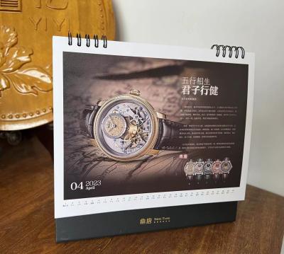 China Die kundengebundene Folie, die bedruckbares Tischkalender-Doppeltes stempelt, versah 250g mit Seiten zu verkaufen