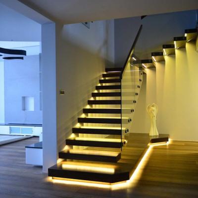 China Space Saving UK Apartment Lighting Staircase Design Pre-Built Solid Wood Floating Stringer Stairs for sale